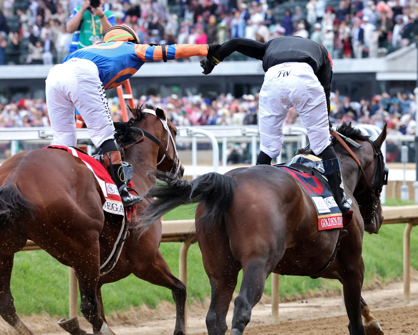 GOLDEN TEMPO - 050226 - Race 12 - CD  The Kentucky Derby G1- 152nd Running - Fist Bump 01 - Coady Media - Kurtis Coady Photography