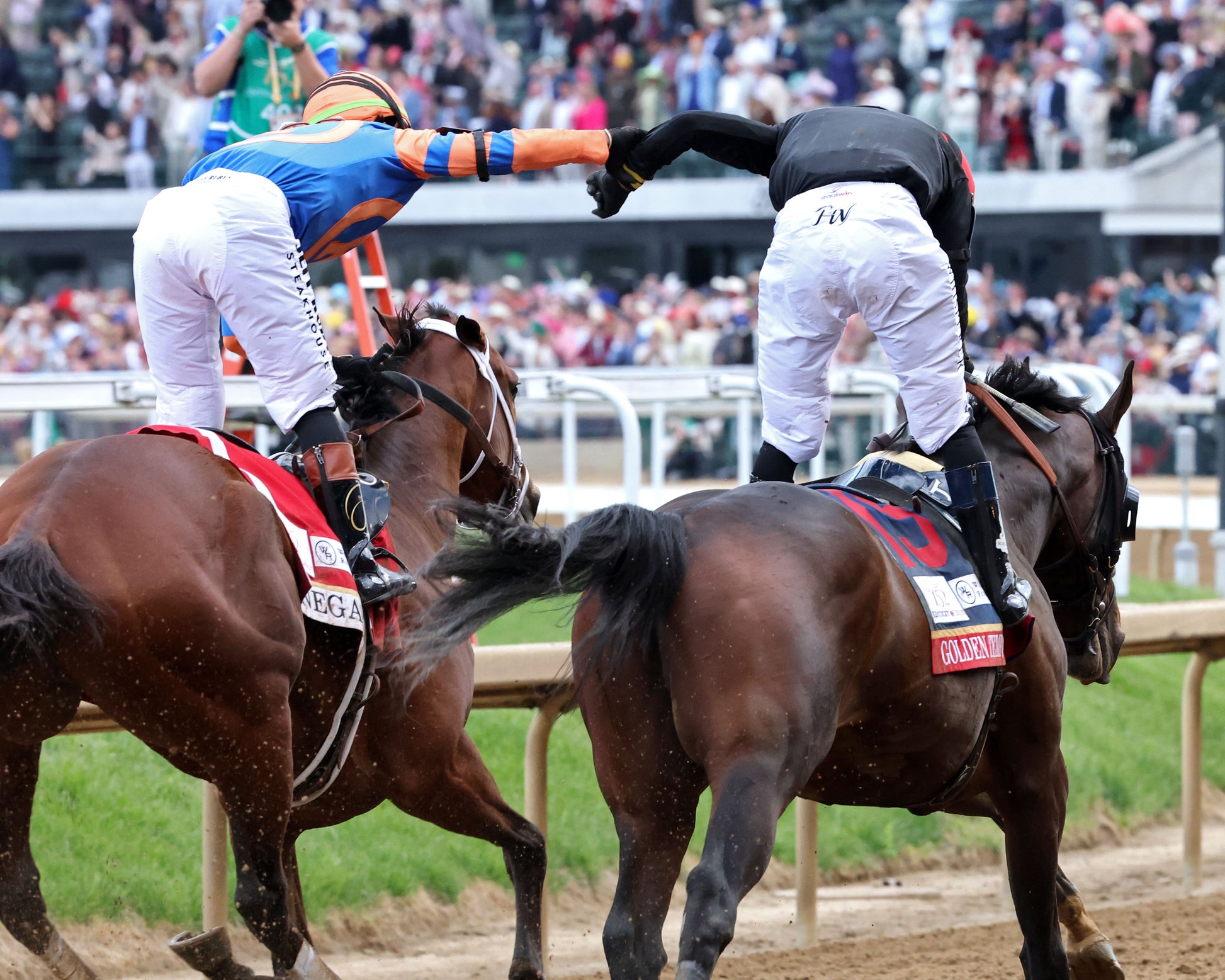 GOLDEN TEMPO - 050226 - Race 12 - CD  The Kentucky Derby G1- 152nd Running - Fist Bump 01 - Coady Media - Kurtis Coady Photography