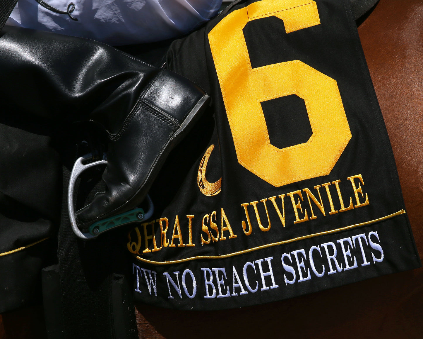 TW NO BEACH SECRETS - QHRAI Stallion Service Auction Futurity Juvenile - 08-30-25 - R07 - Horseshoe Indiana - Saddle Towel 01 - Sammantha Pagels - Coady Media - Kurtis Coady Photography