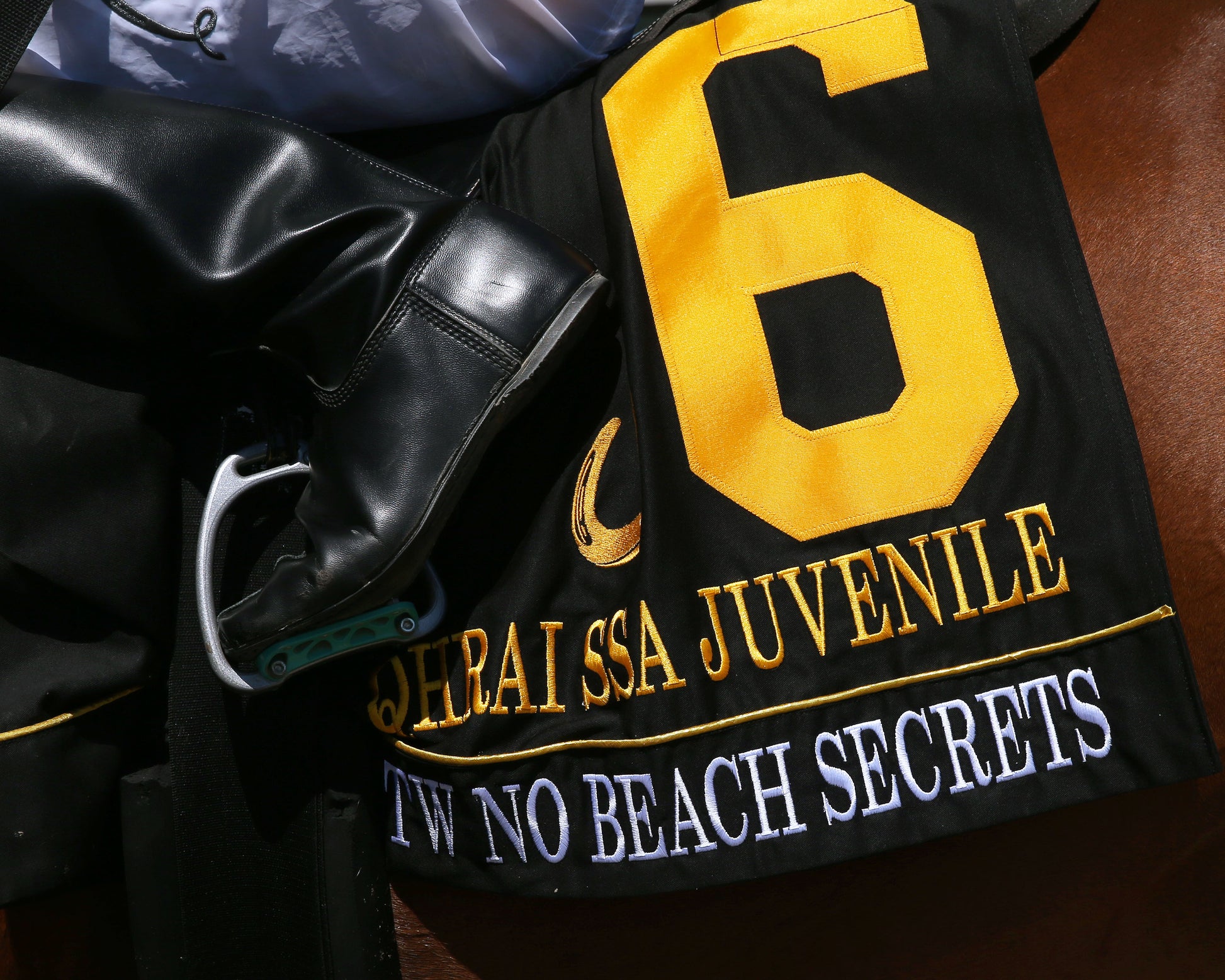 TW NO BEACH SECRETS - QHRAI Stallion Service Auction Futurity Juvenile - 08-30-25 - R07 - Horseshoe Indiana - Saddle Towel 01 - Sammantha Pagels - Coady Media - Kurtis Coady Photography